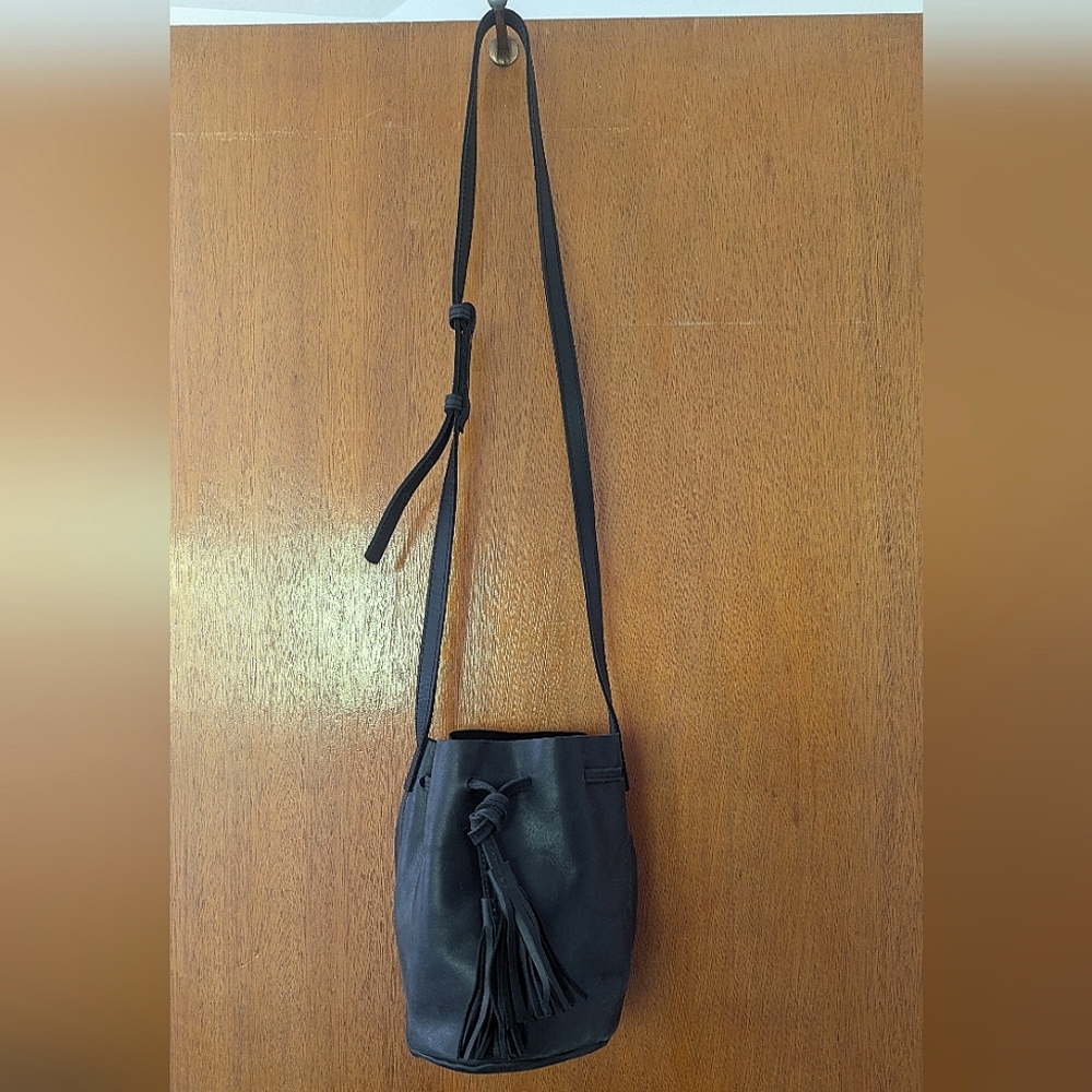 ABLE Black Leather Bucket Bag With Tassel Detail